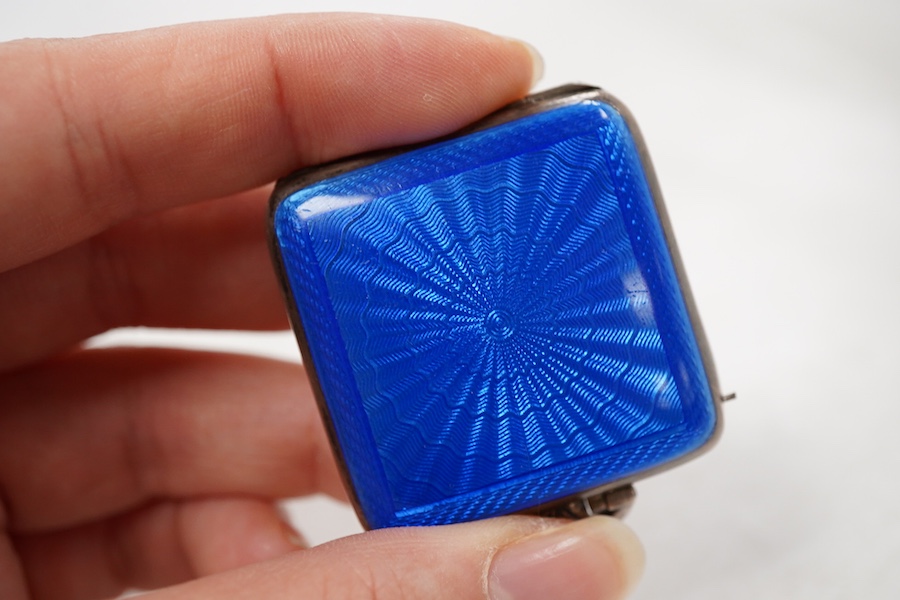 A George V silver and blue guilloche enamel travelling folding timepiece, maker SSM, Birmingham, 1931, with Arabic dial and subsidiary seconds, case diameter 37mm, enamel a.f.